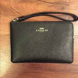 Coach small wristlet.